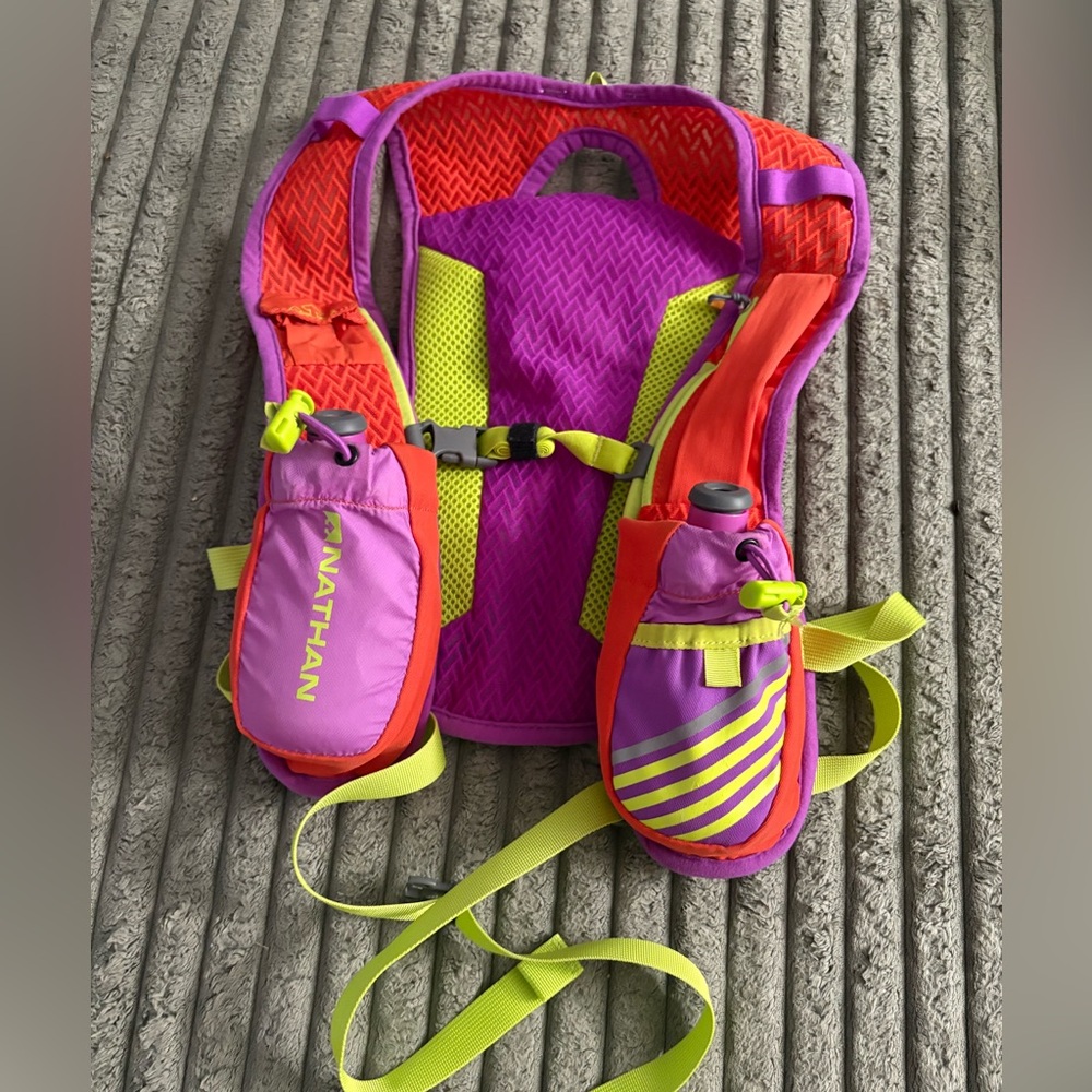 Nathan Women's Vibrant Hydration Vest - Purple, Red, and Yellow